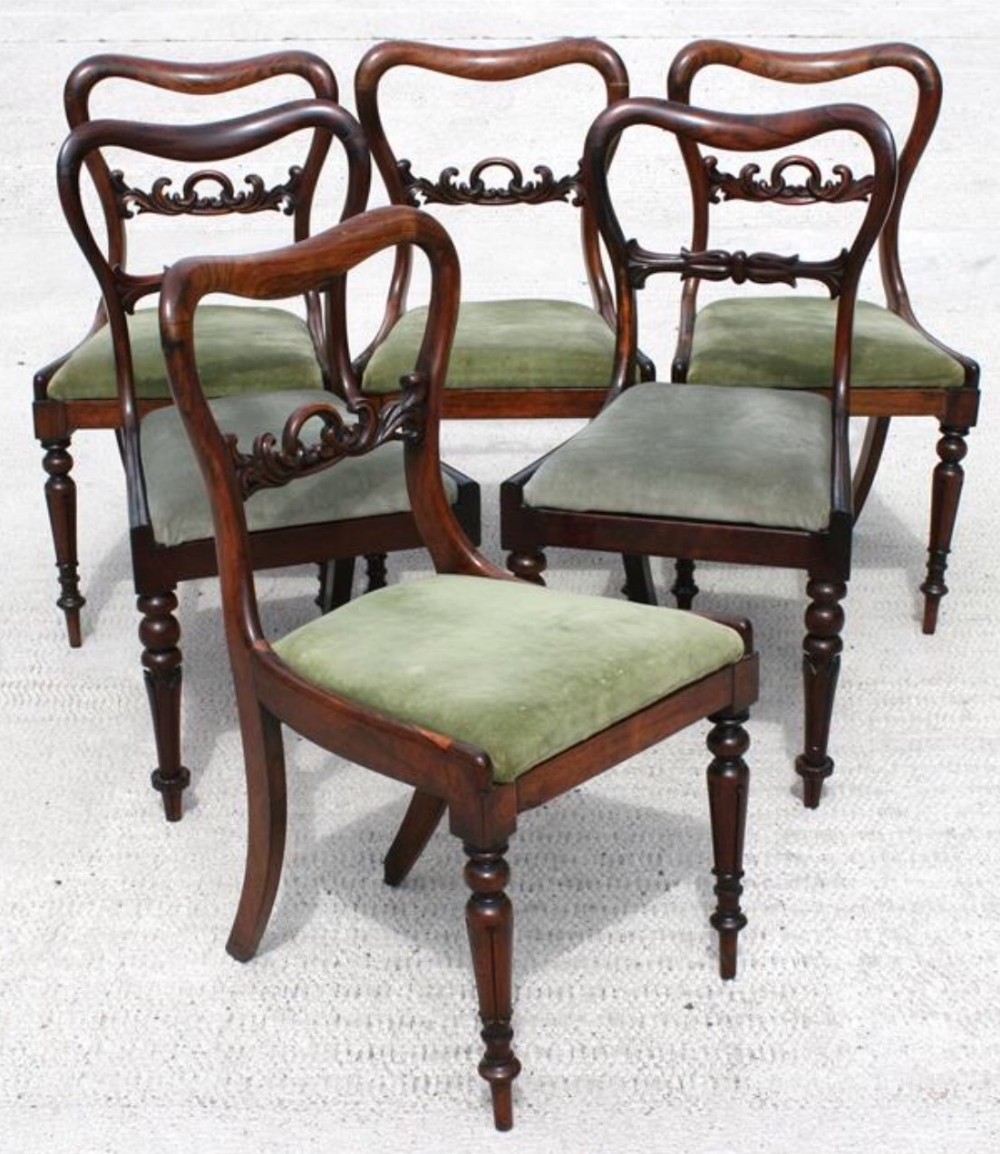 Harlequin set of four plus two rosewood chairs 