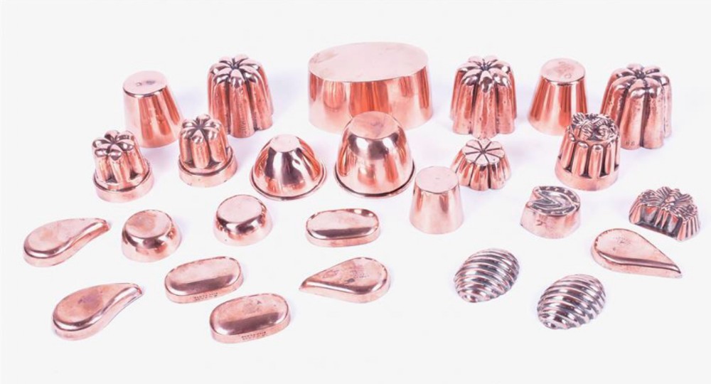 A collection of 26 small late C19th copper moilds 