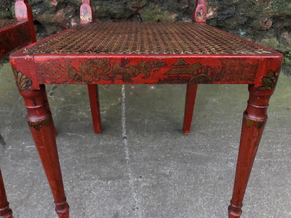 A good pair of chinoiserie decorated red lacquered chairs  View V