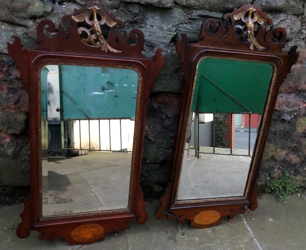 Pair of parcel gilt fretwork pier mirrors with ho ho birds and inlaid shells View II