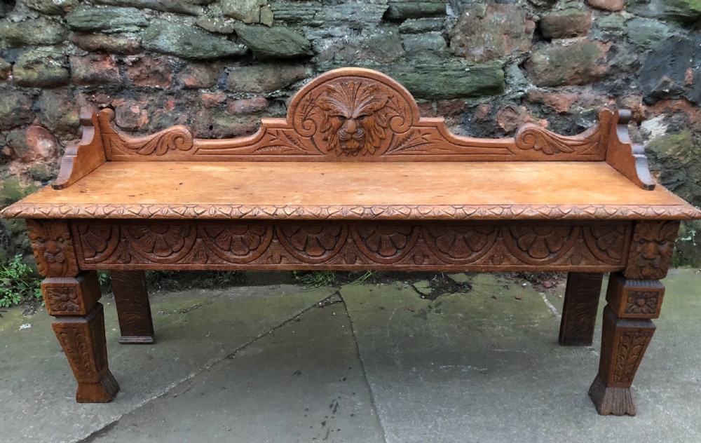 C19th oak carved hall bench 