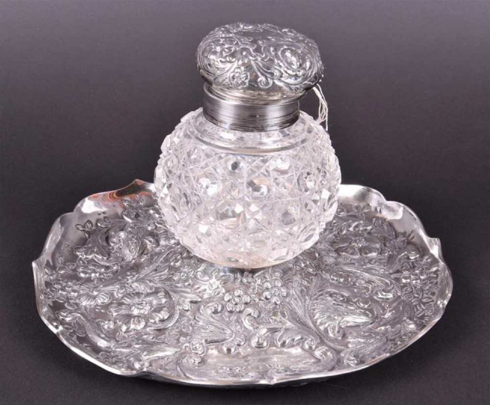 A C19th HM silver and cut glass inkwell and dish