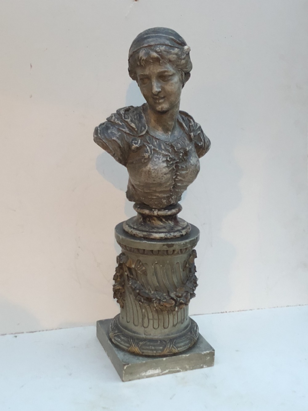 C19th painted plaster bust on carved wooden stand 
