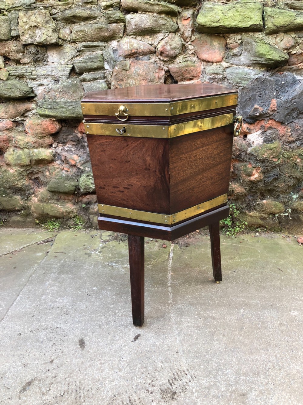 A Georgian Mahogany brass bound wine cooler. View II