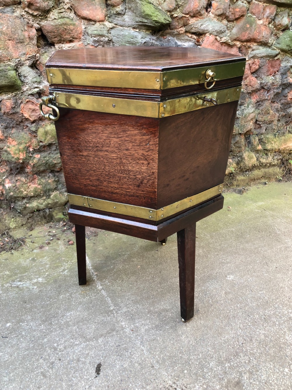 A Georgian Mahogany brass bound wine cooler. View III