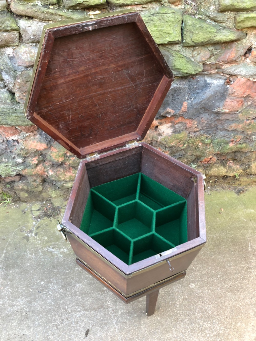 A Georgian Mahogany brass bound wine cooler. View V