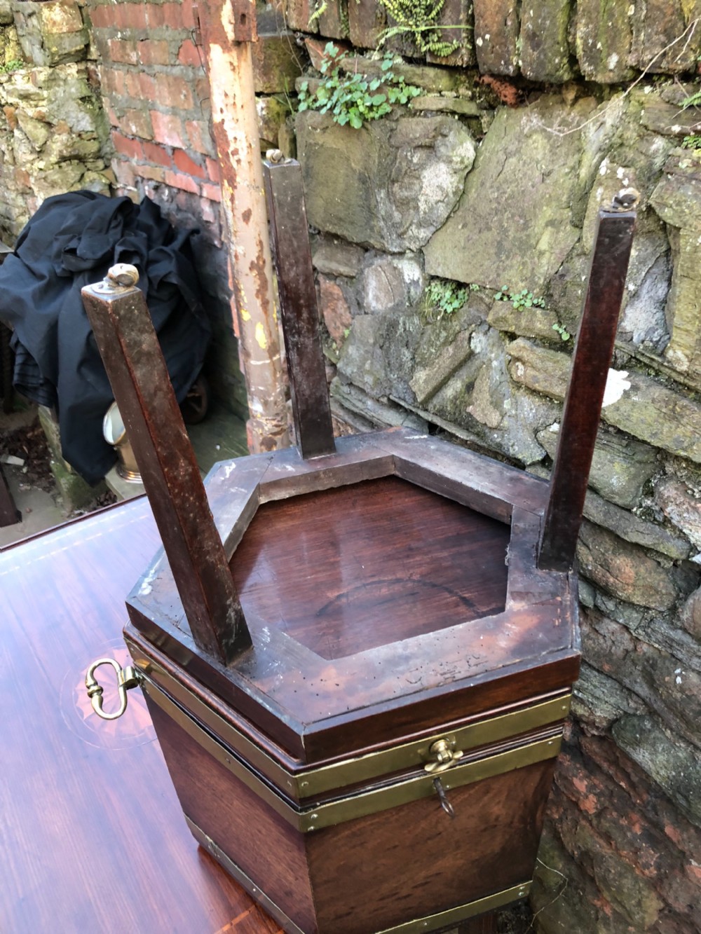 A Georgian Mahogany brass bound wine cooler. View VII