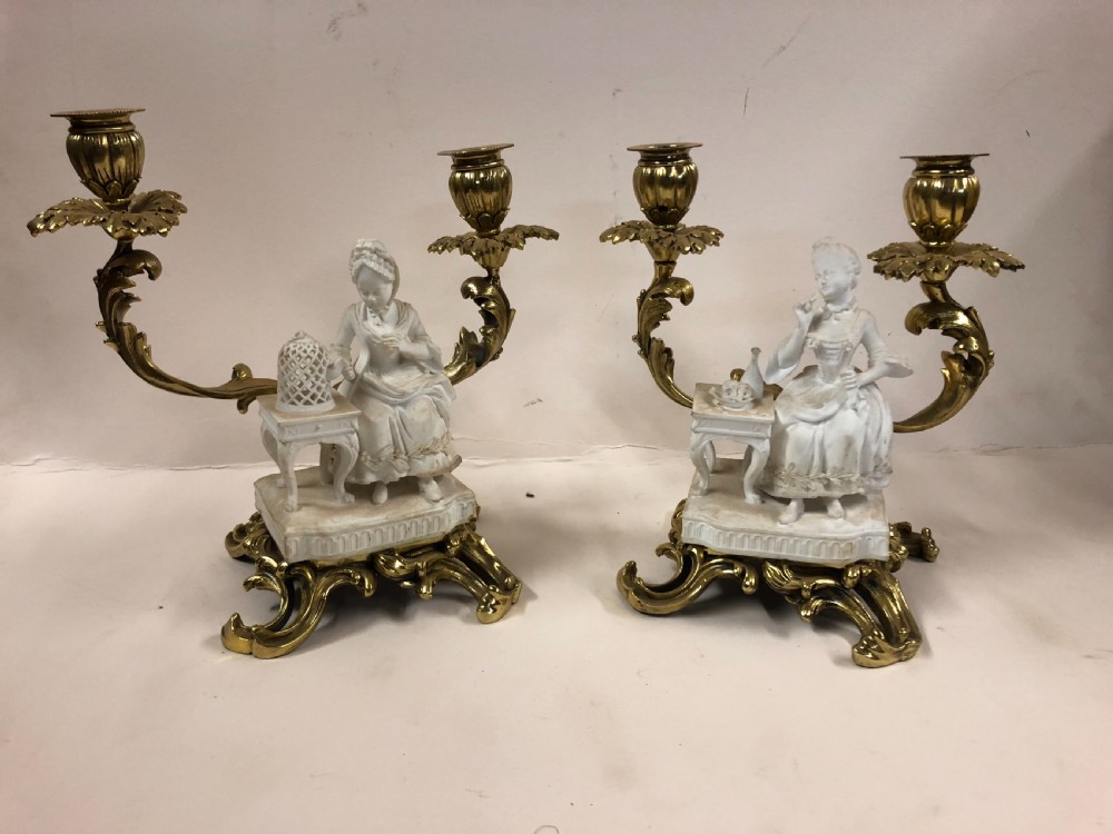 Pair of ormolu candelabras with Parian figures 