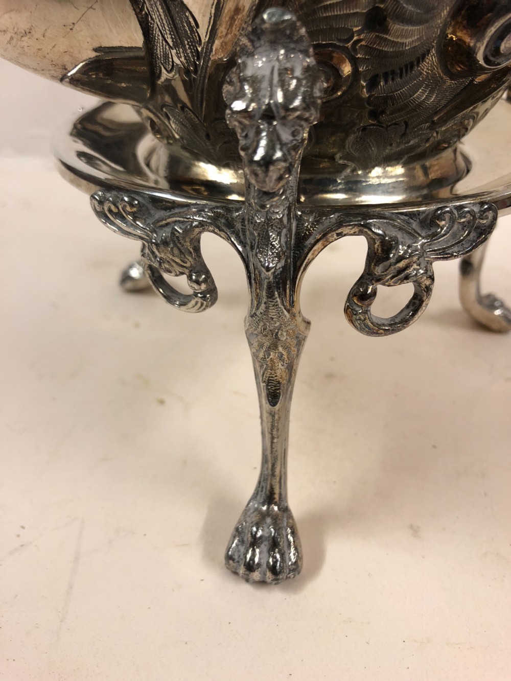 A silver plated kettle on stand  View VI