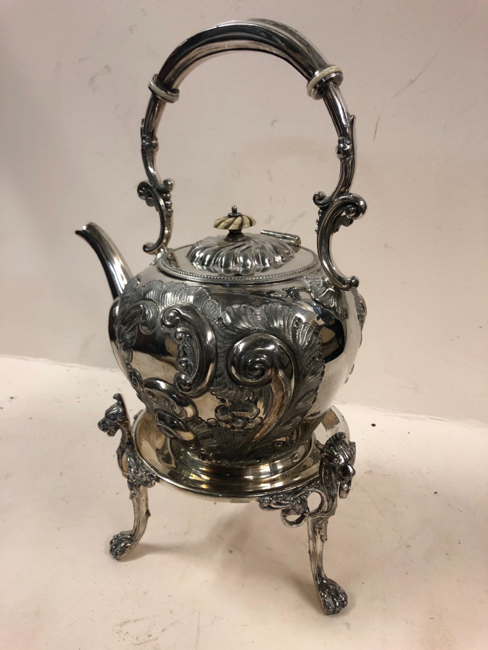 A silver plated kettle on stand  View VIII