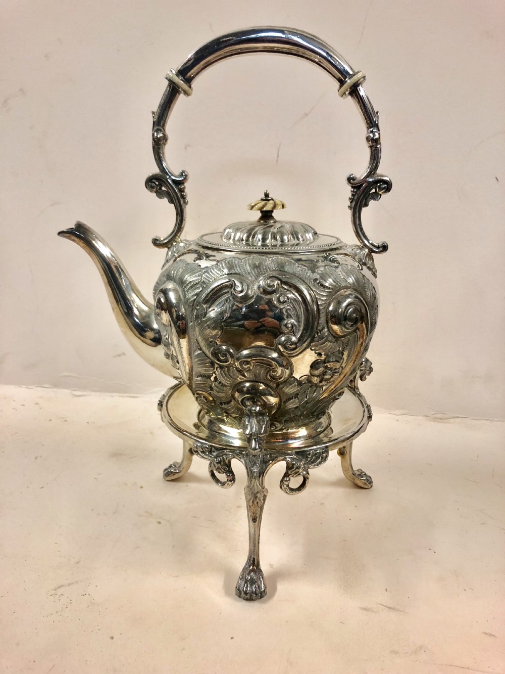 A silver plated kettle on stand  View XI