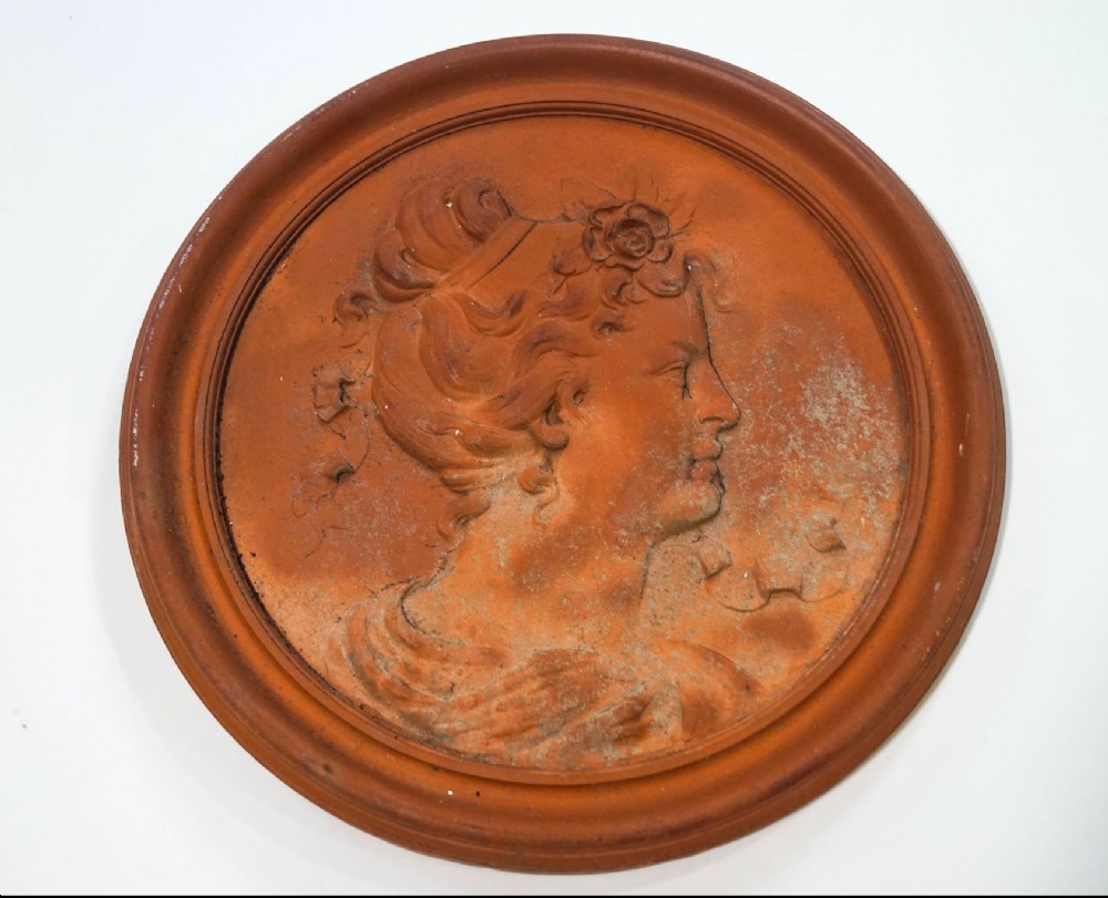 C19th terracotta roundel 