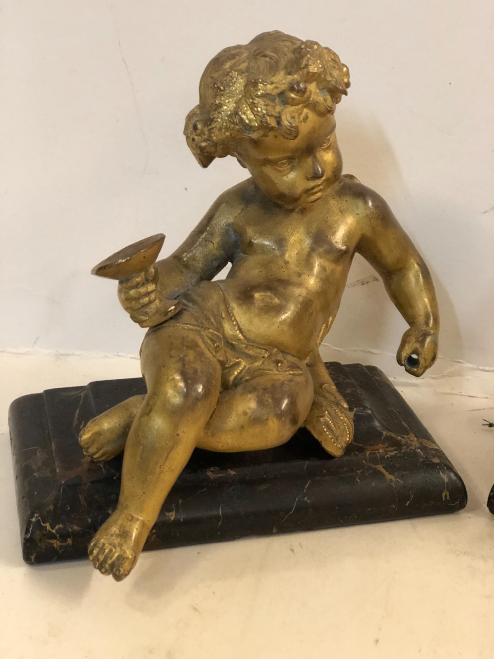 Pair of gilt metal cherub ornaments on marble bases View VIII