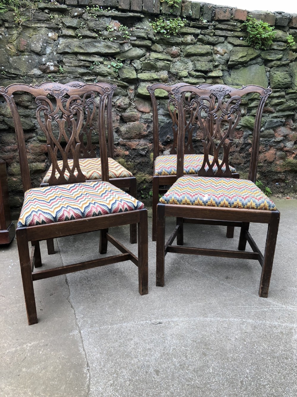 Set of four George III Chippendale style chairs
