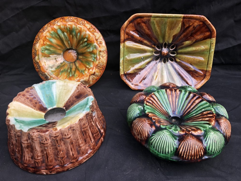 Four C19th Majolica spittoons 