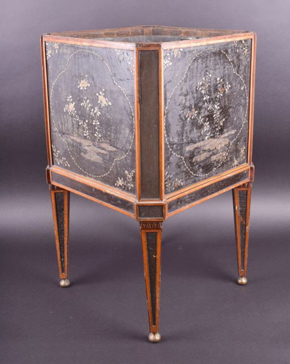A late Georgian fruitwood and lacquered panelled floor planter