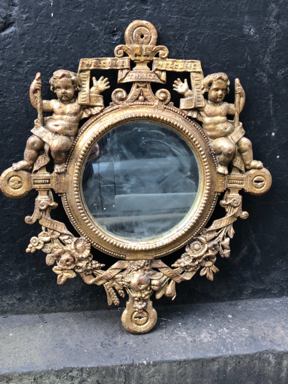 Cast iron wall mirror