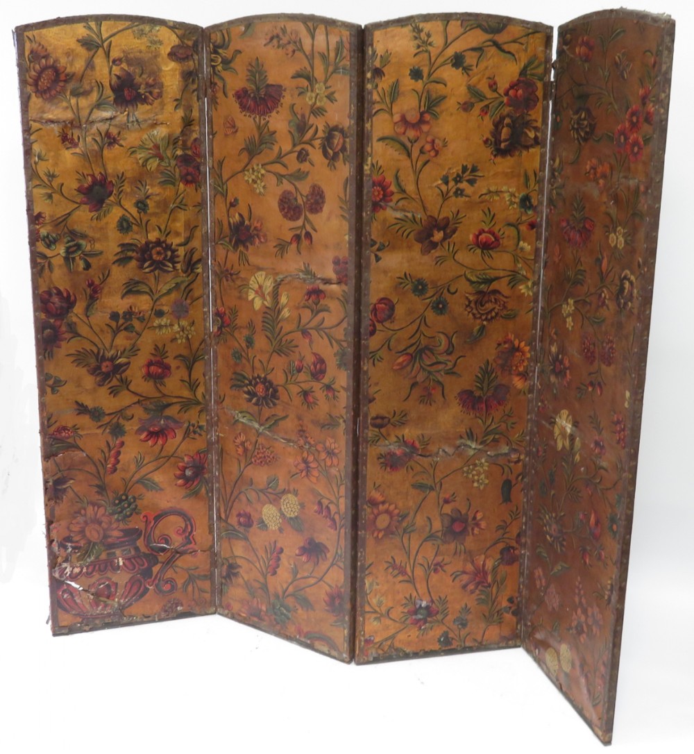 A C19th four fold painted leather screen 