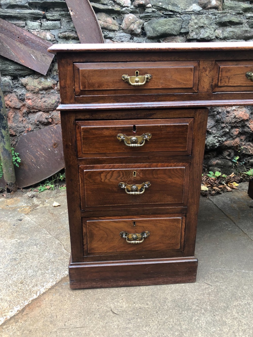 C19th walnut nine drawer pedestal desk with inset leather top View III
