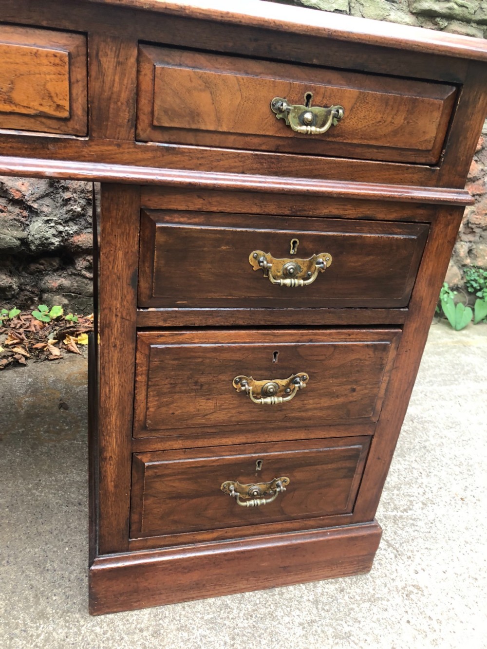 C19th walnut nine drawer pedestal desk with inset leather top View IV