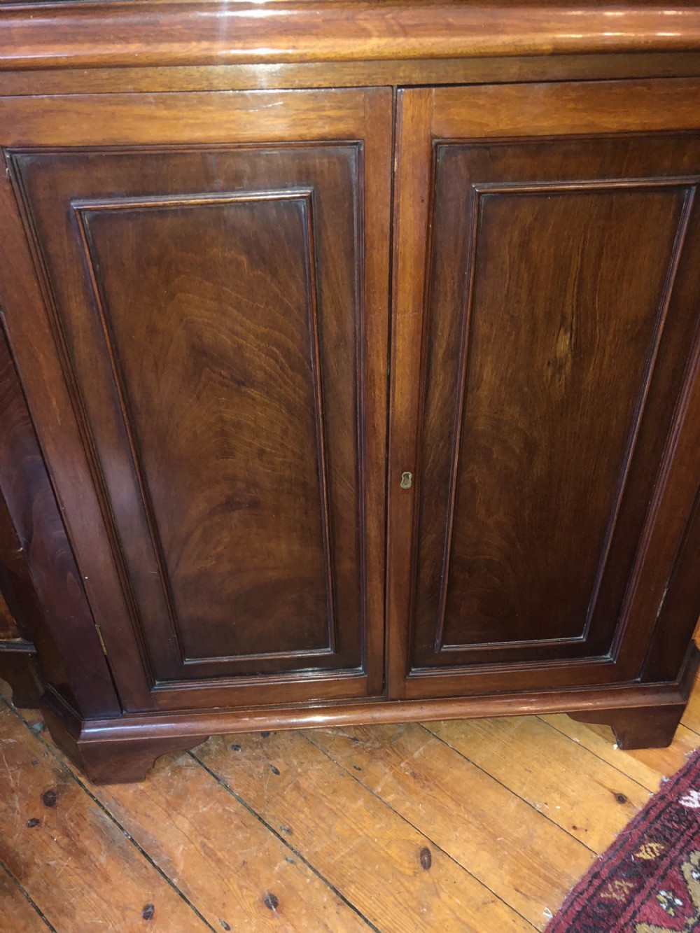 A Georgian full height library corner cupboard View IV