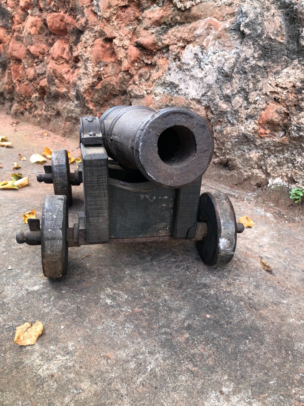 C19th small cannon on wood and cast iron stand  View III