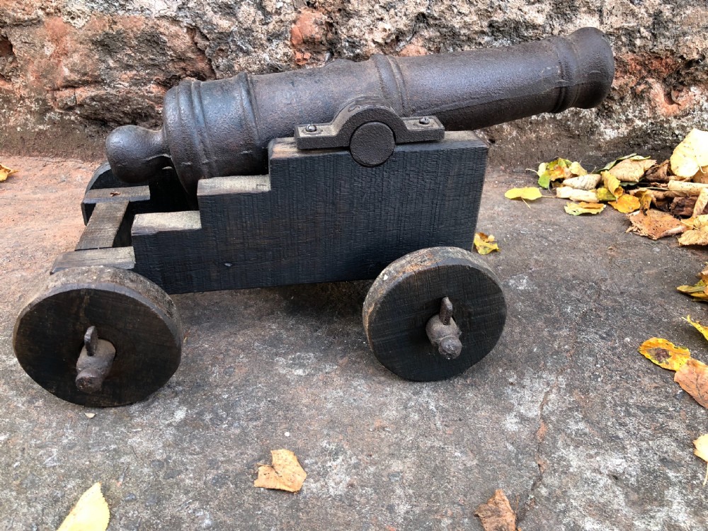 C19th small cannon on wood and cast iron stand  View VII