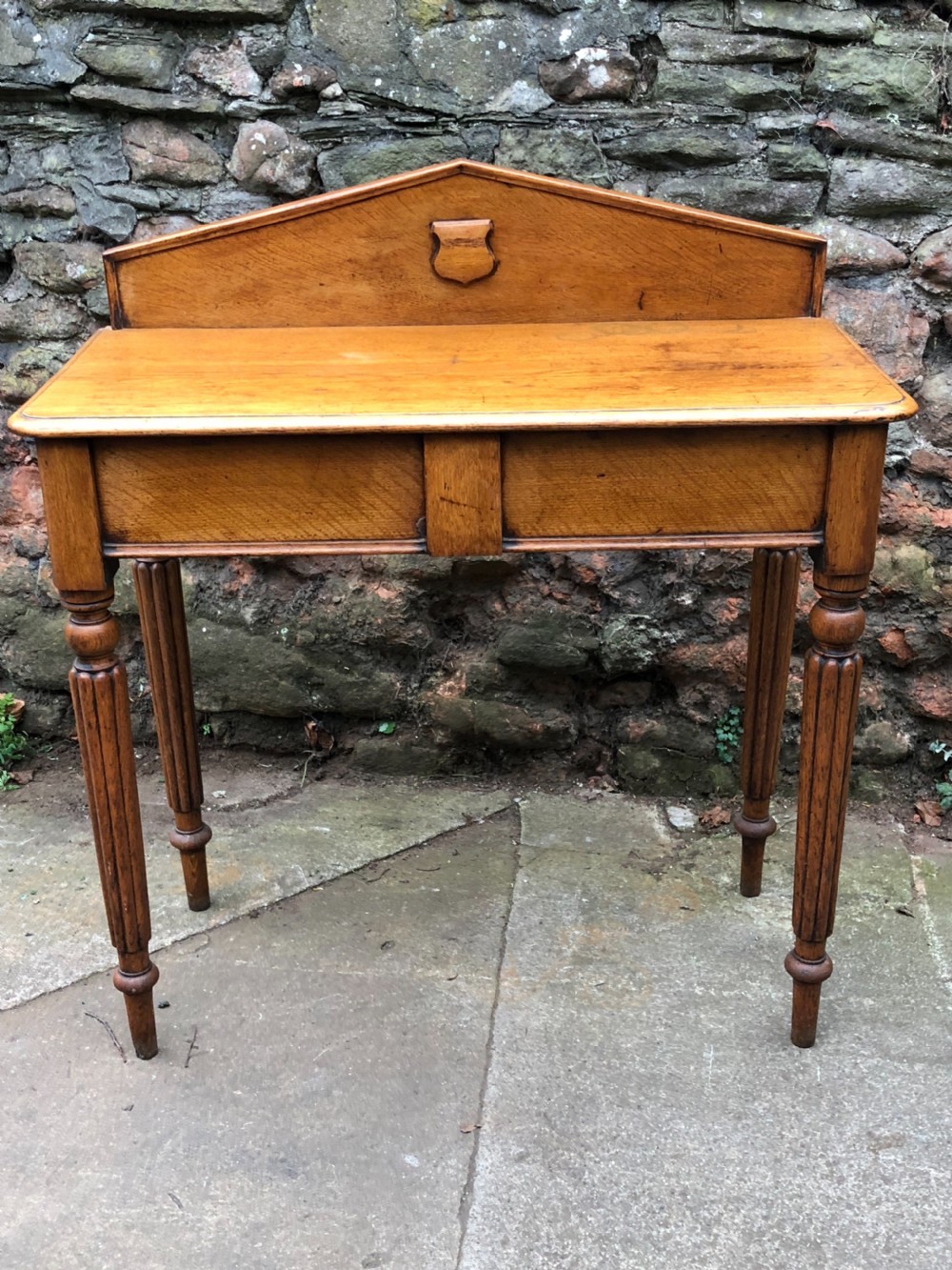 C19th golden oak hall table of small proportions on fluted legs View IV