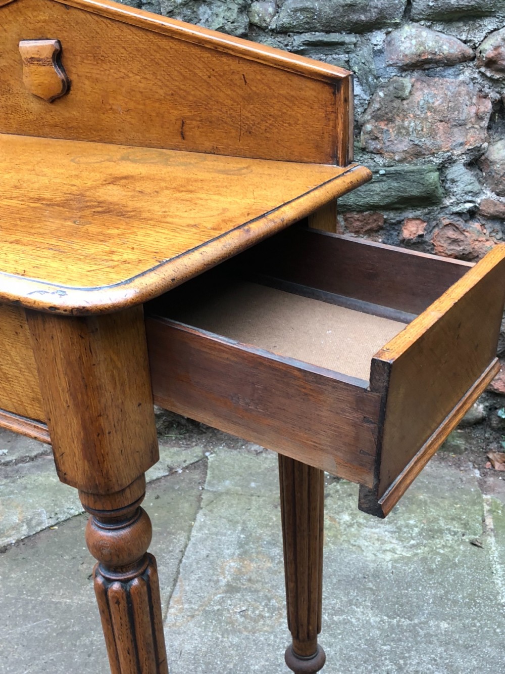 C19th golden oak hall table of small proportions on fluted legs View VI
