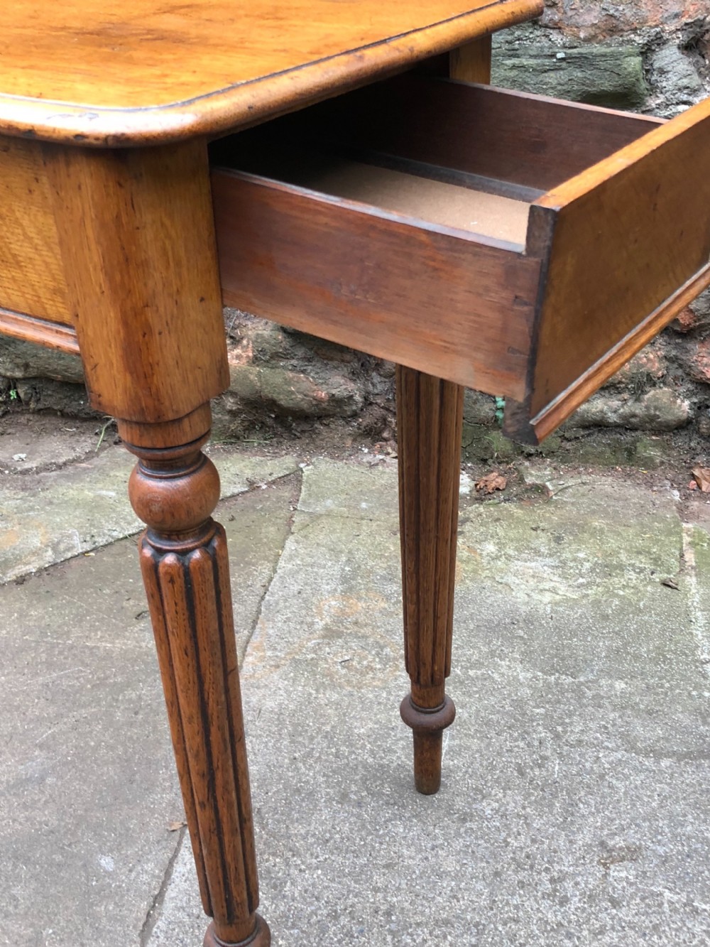 C19th golden oak hall table of small proportions on fluted legs View VII