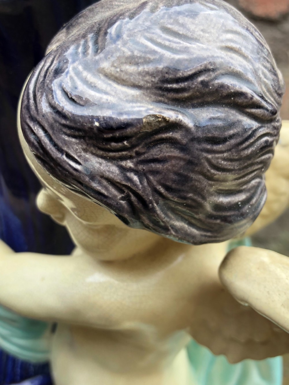 C19th large majolica cherub holding a cornucopia  View VI