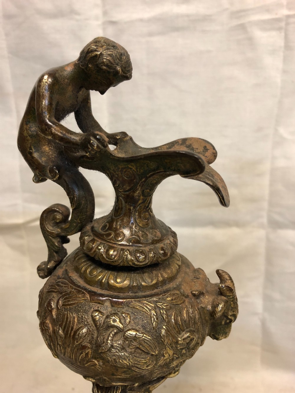 Pair of Classical gilt bronze urns on marble bases  View II