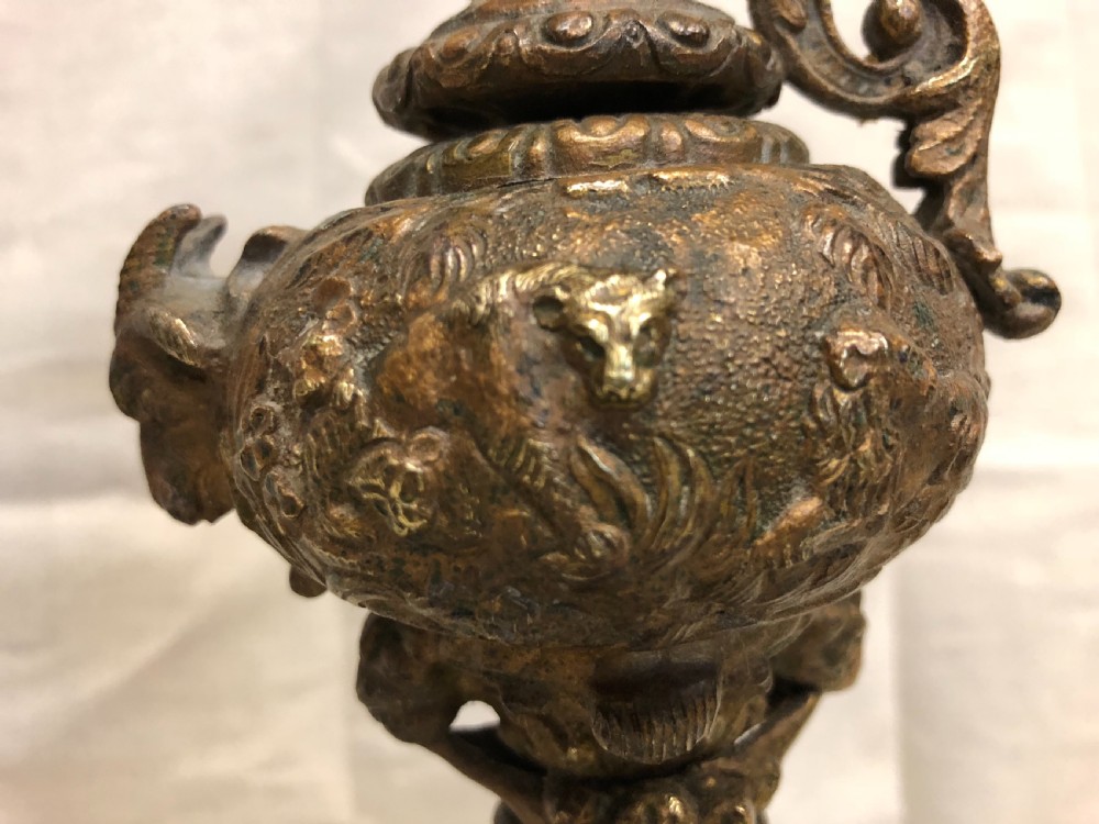 Pair of Classical gilt bronze urns on marble bases  View V