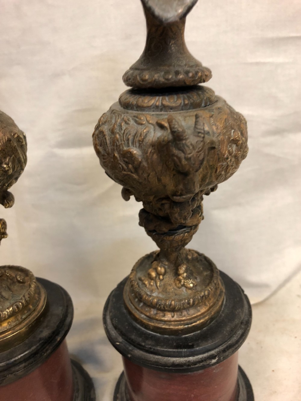 Pair of Classical gilt bronze urns on marble bases  View VIII
