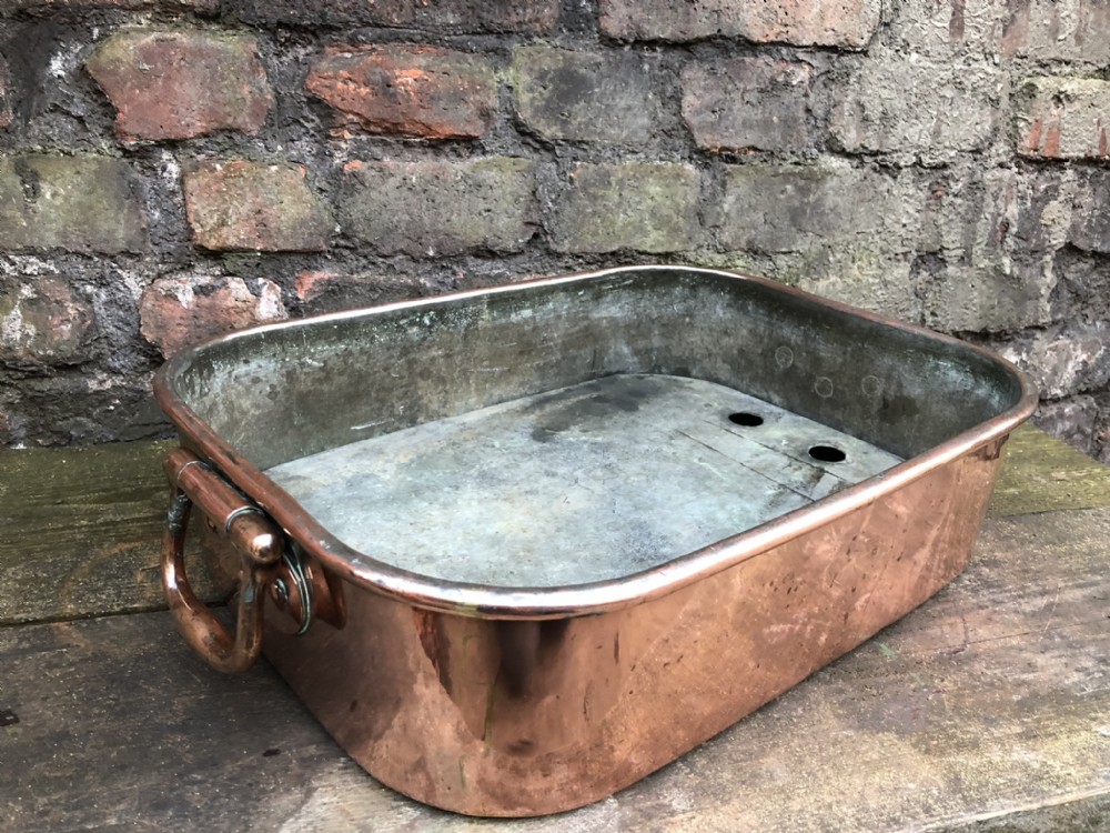 A heavy copper two handled steaming pan by benham and froude 