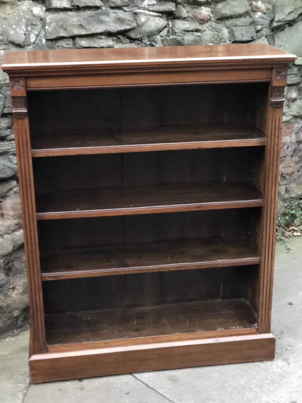 A Victorian Walnut bookcase with adjustable shelves  View VII