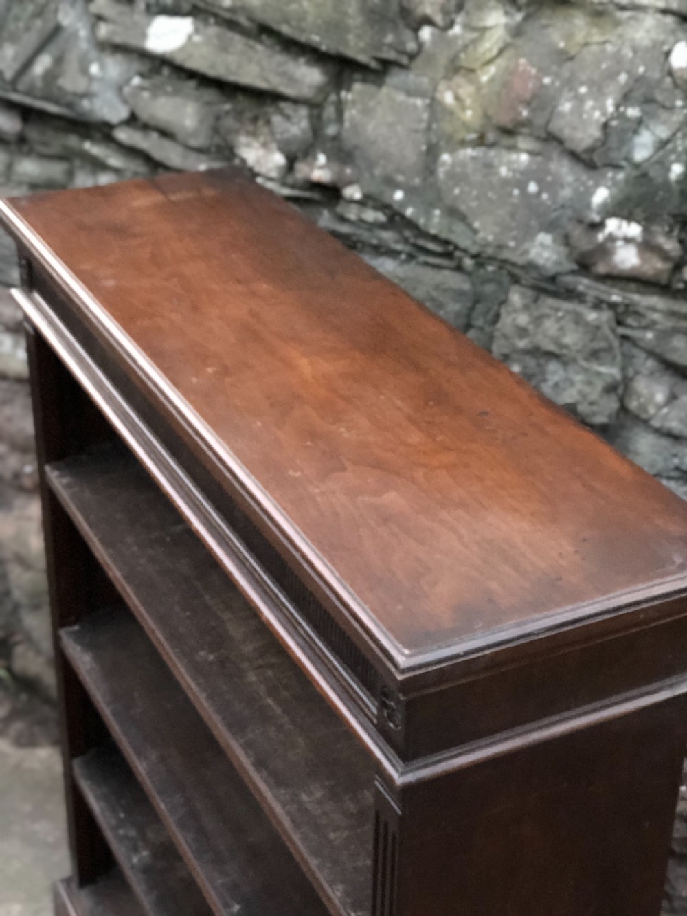 A small Victorian Walnut bookcase with three adjustable shelves  View III