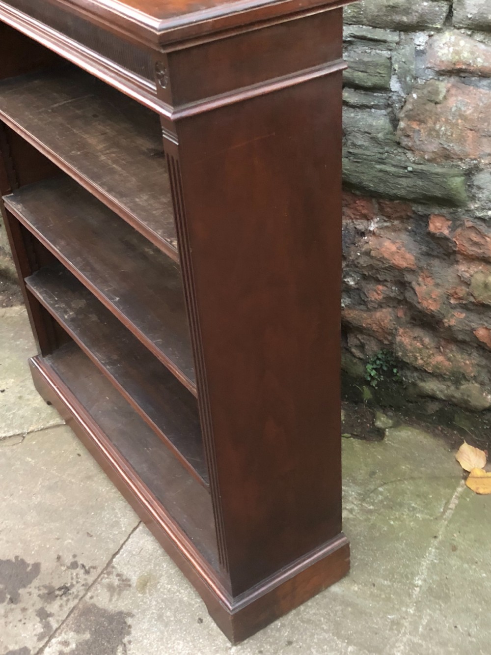 A small Victorian Walnut bookcase with three adjustable shelves  View IV