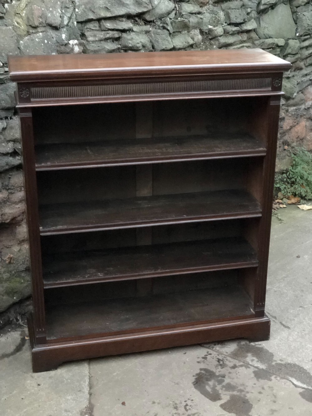 A small Victorian Walnut bookcase with three adjustable shelves  View VI
