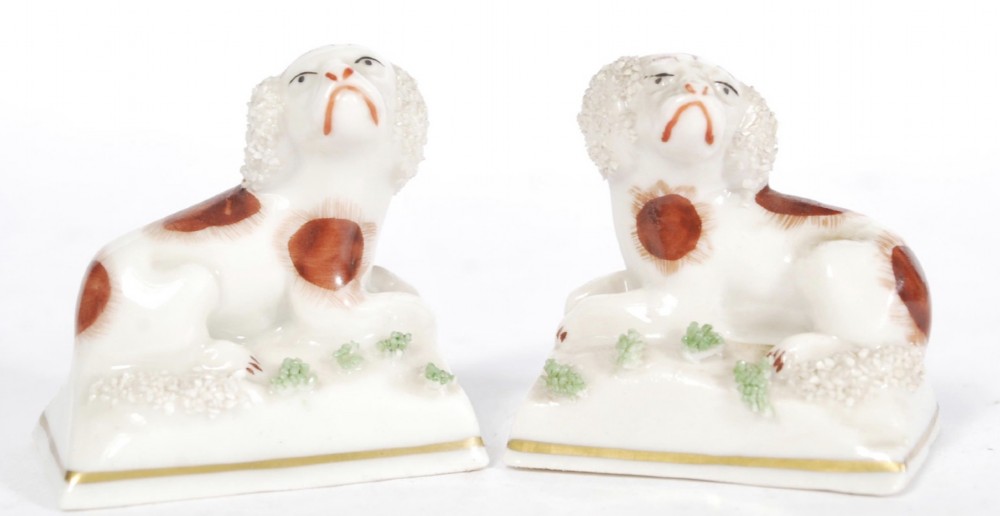 Pair of Chelsea porcelain miniature dogs