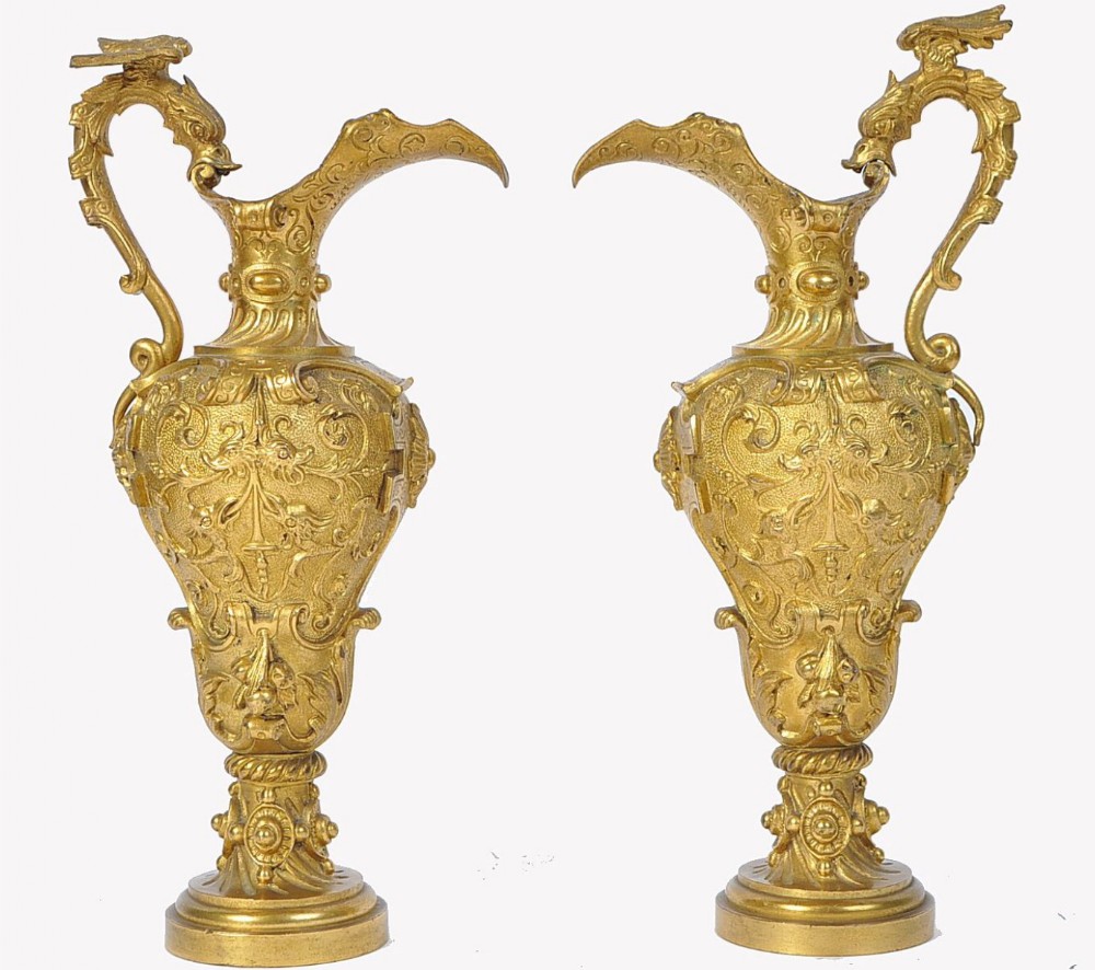 C19th pair of ormolu classical water Ewers of classical form 