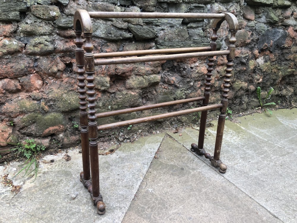 C19th arched top mahogany towel rail
