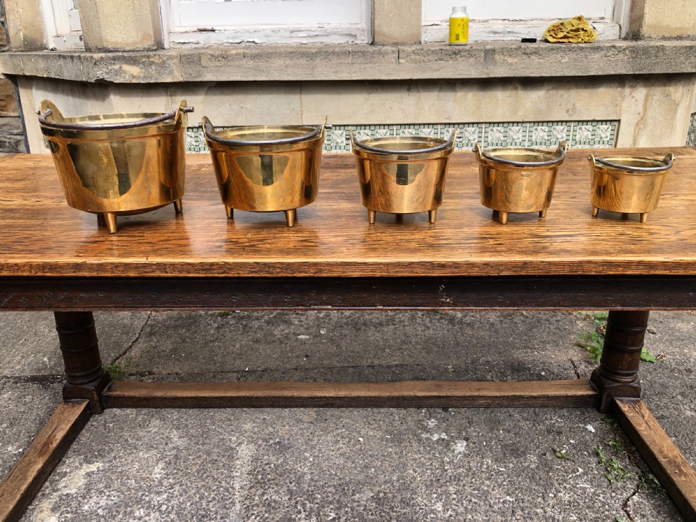 C19th graduating set of 5 brass cooking pans with feet  View II