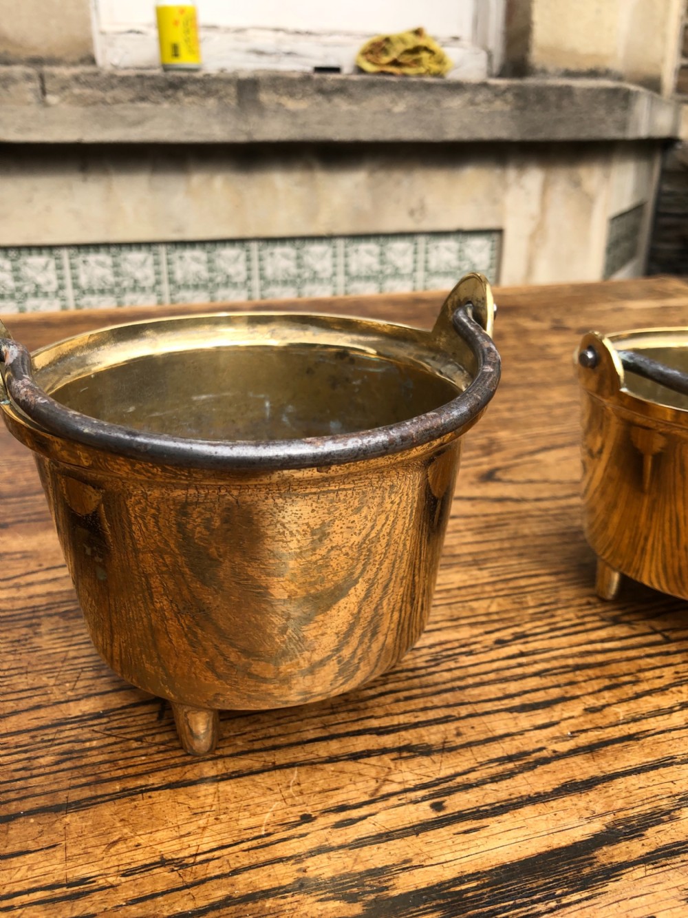 C19th graduating set of 5 brass cooking pans with feet  View VII