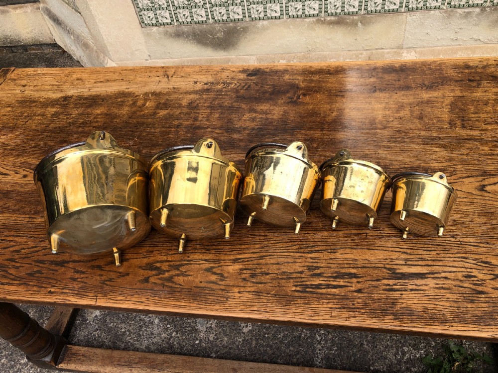 C19th graduating set of 5 brass cooking pans with feet  View XI