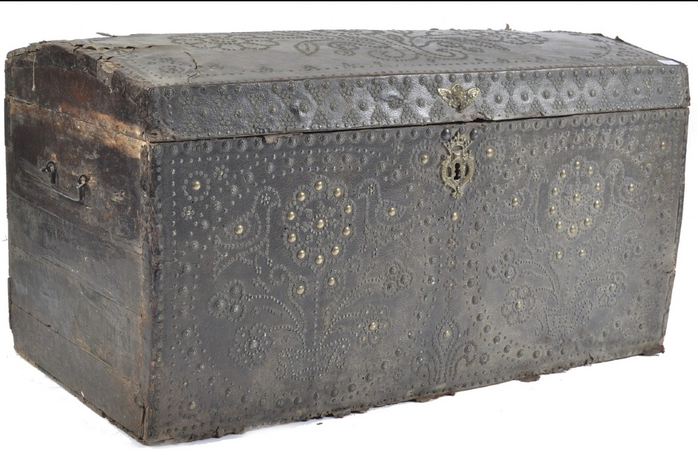 Early C18th leather studded domed top trunk 