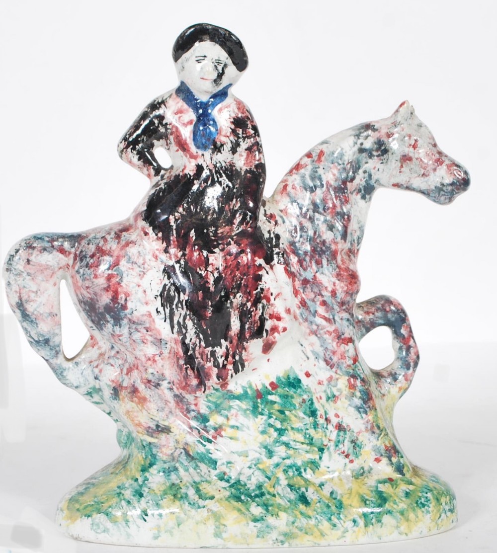 Early C19th spongeware staffordshire horseman