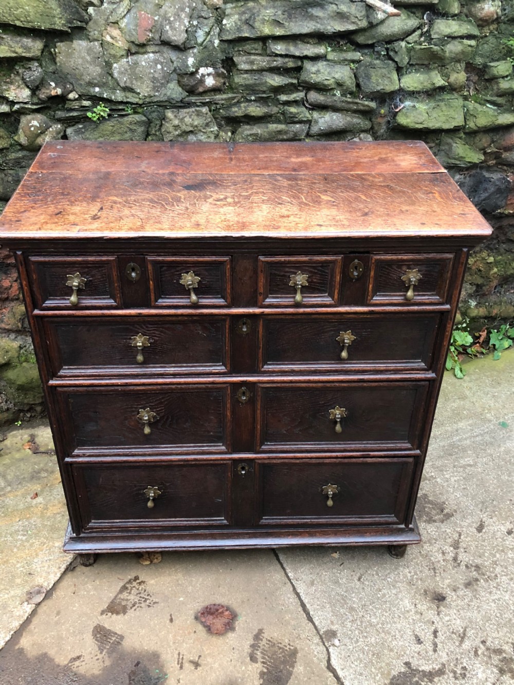 Small C18th block fronted chest of five drawers  View II