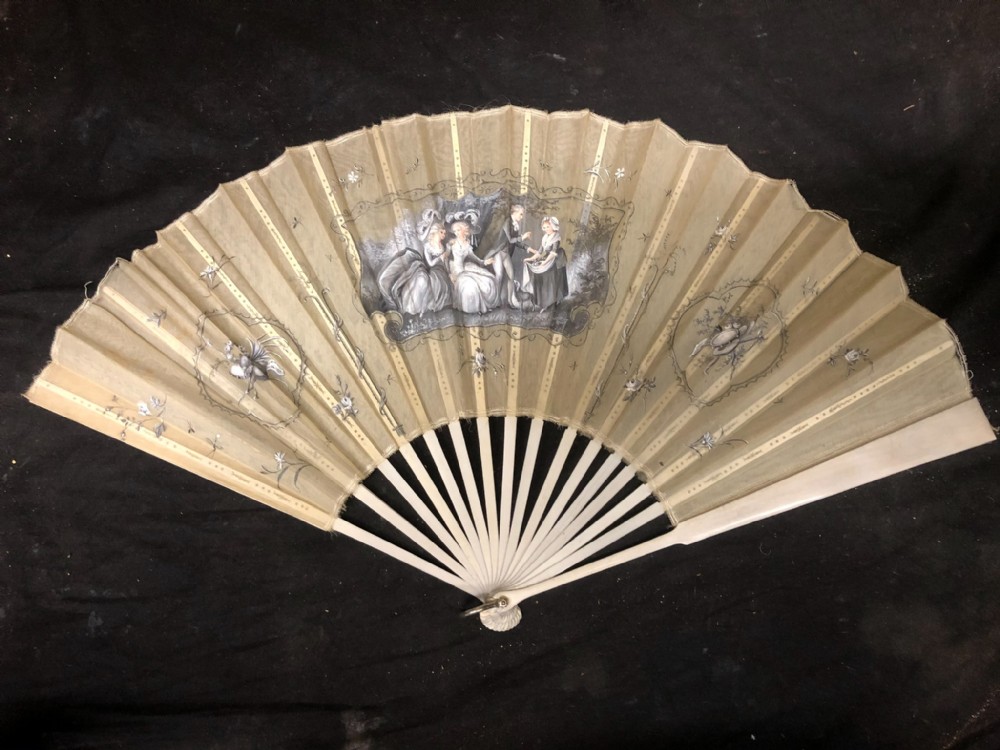 A painted fan of white gauze with papier-mâché guard and sticks