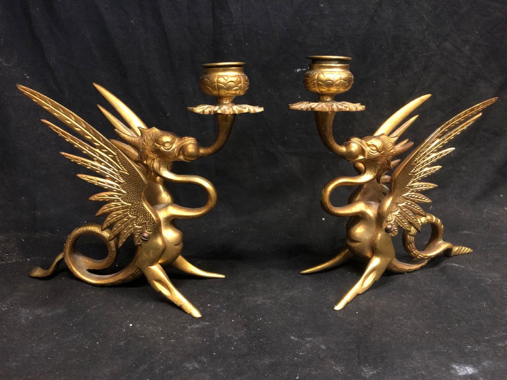 C19tg pair of gilt bronze candlesticks shaped as griffins View II
